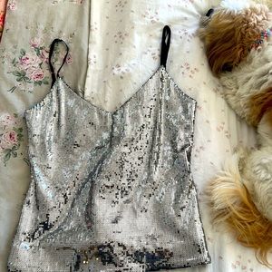 Small silver glitter tank top.